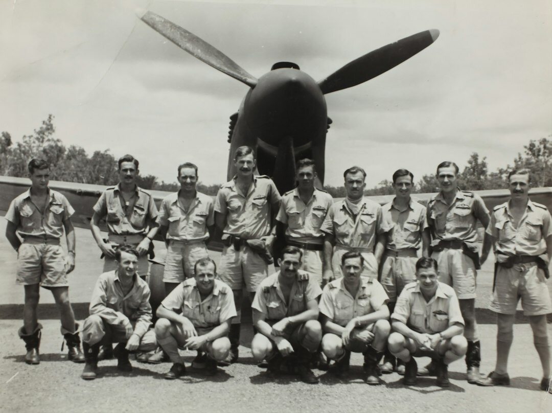 Group of broadcast trainers standing together in a television studio