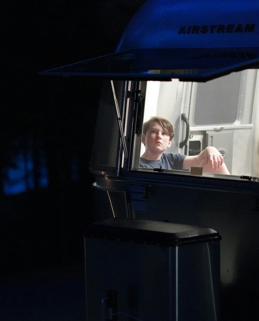 Graduate operating a broadcast switcher in an outside broadcast truck